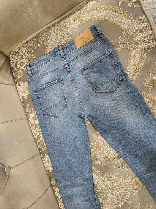 Джинсы новые colins