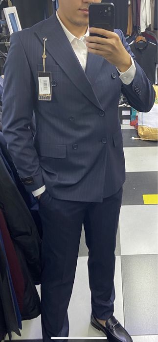 Продам костюм двухбортный