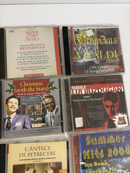11 cd uri muzica si nu numai