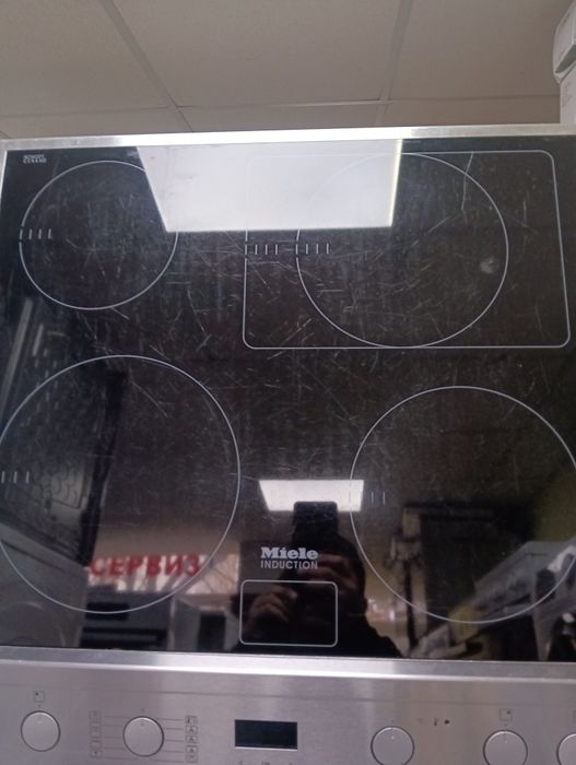 Иноксова печка за вграждане с индукционни котлони Миеле Miele Гаранция