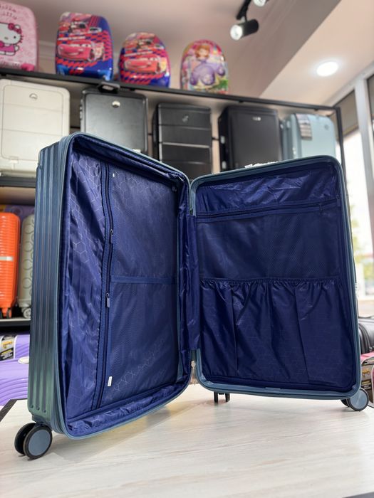 Чемодан большой из поликарбоната новый