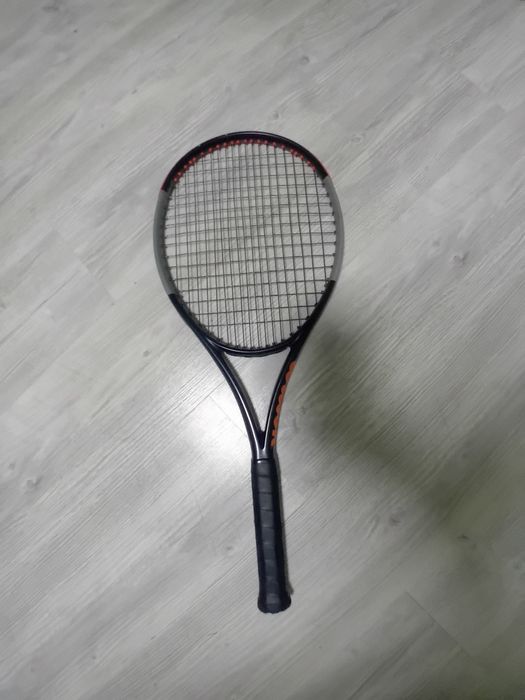 Rachetă tenis Wilson Burn 100ULS v4(100 cm llățime 645 lungime)