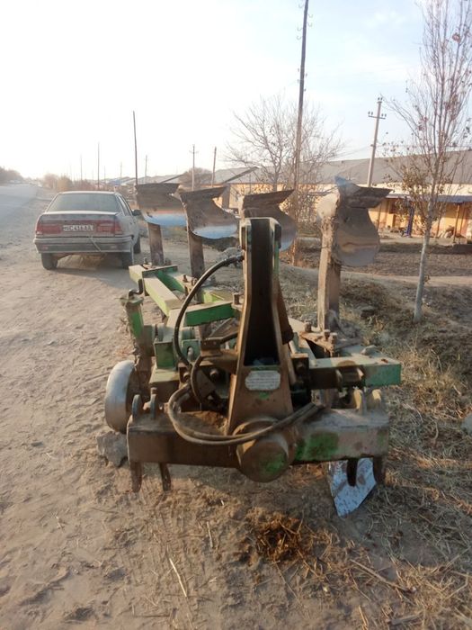 New Holland aylanma puliq bilan