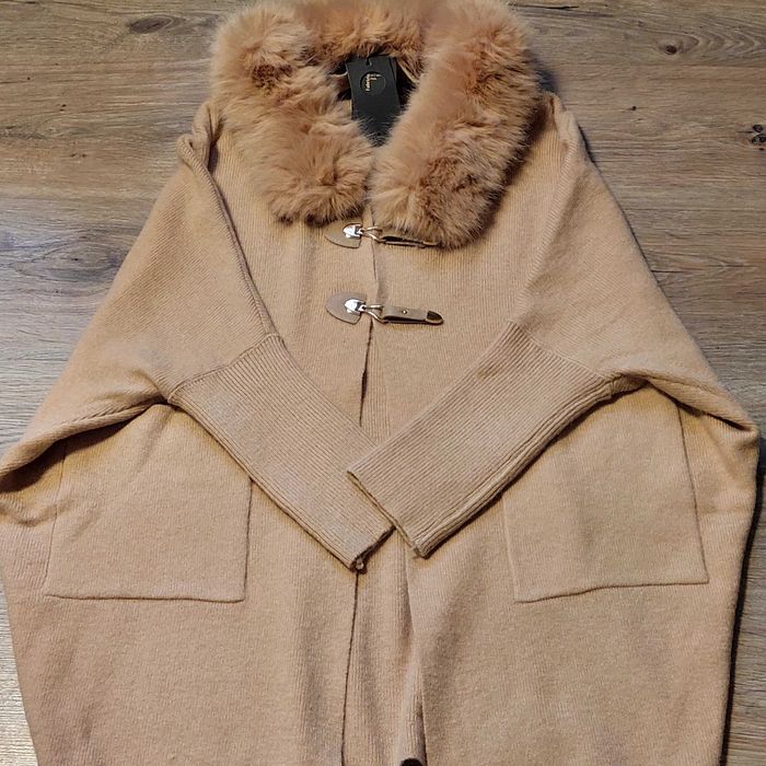 Дамска жилетка с пух