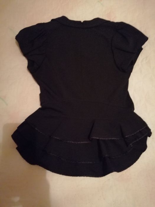 Елегантен елек с пеплум