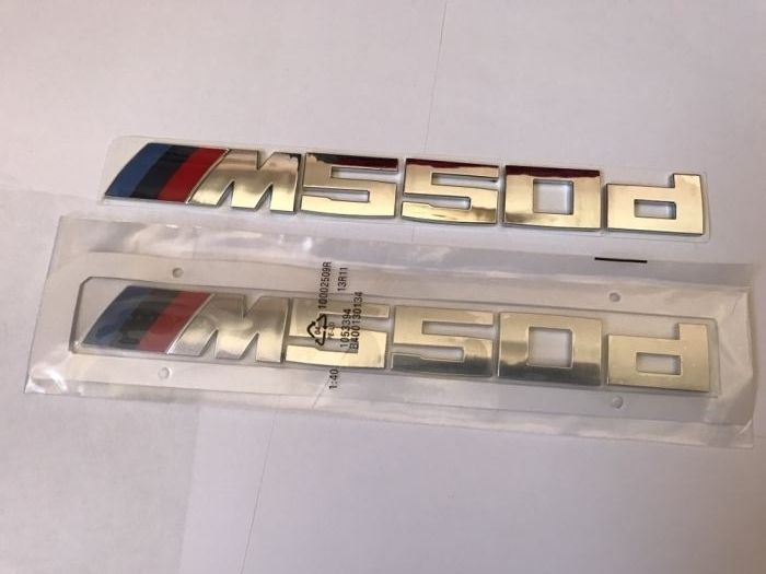 Emblema BMW M550d
