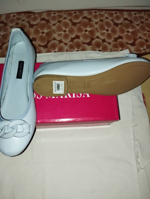 Балетки голубые.