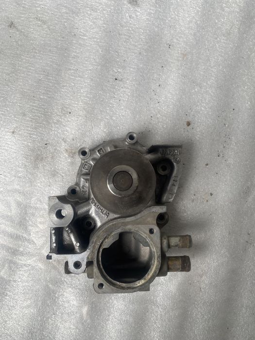 Помпа Subaru ej255