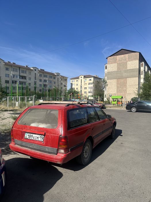 Мазда 626.