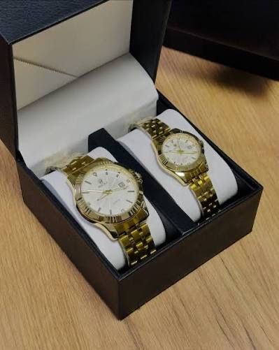 Алтын түсті жұп сағаттар