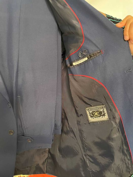 Костюмы   синего цвета