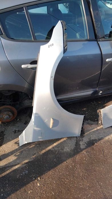 Aripa stanga/dreapta Bmw E60 an 2006