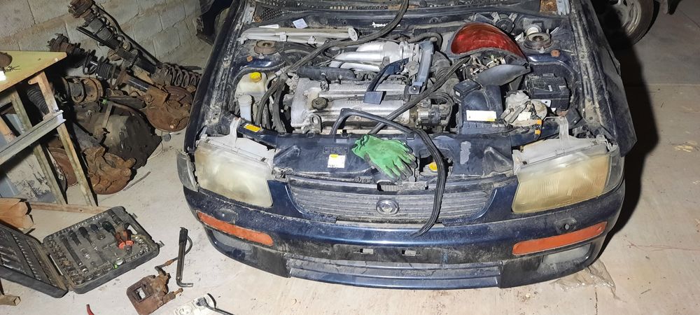 Запчасти Mazda 323