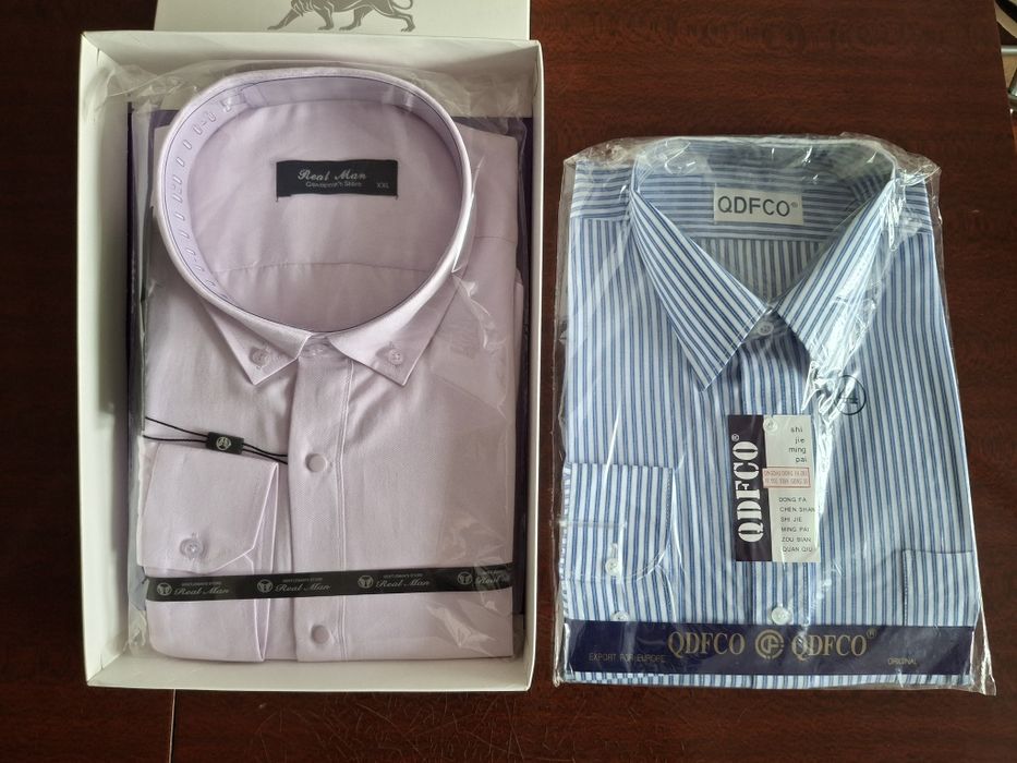 Сорочки мужские новые