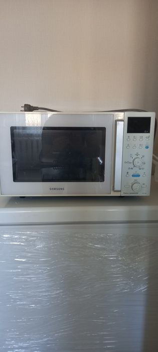 Продам микроволновую бытовую печь  25000
