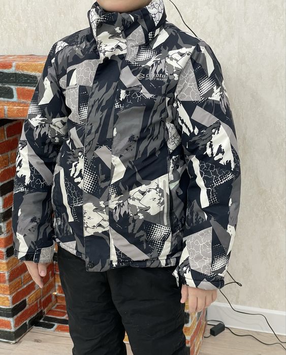 Продам комбинезон на мальчика 7-9лет