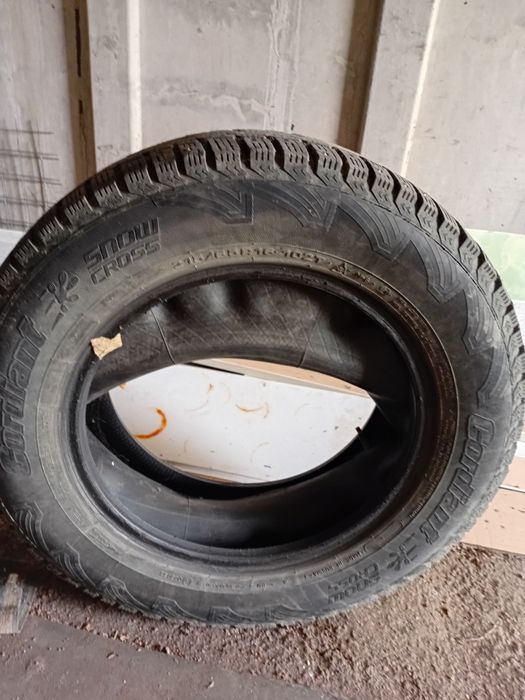 Продам 2 б/у шины шипованые