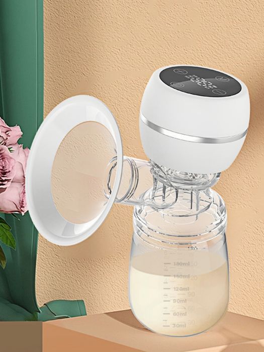 Электрический молокоотсос.