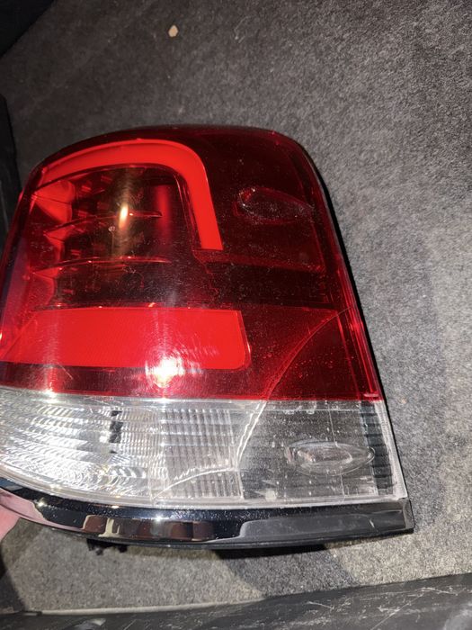 Фонарь задний на крыло TLC 200