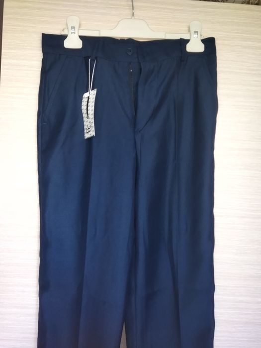 Новые школьные брюки 42 рр