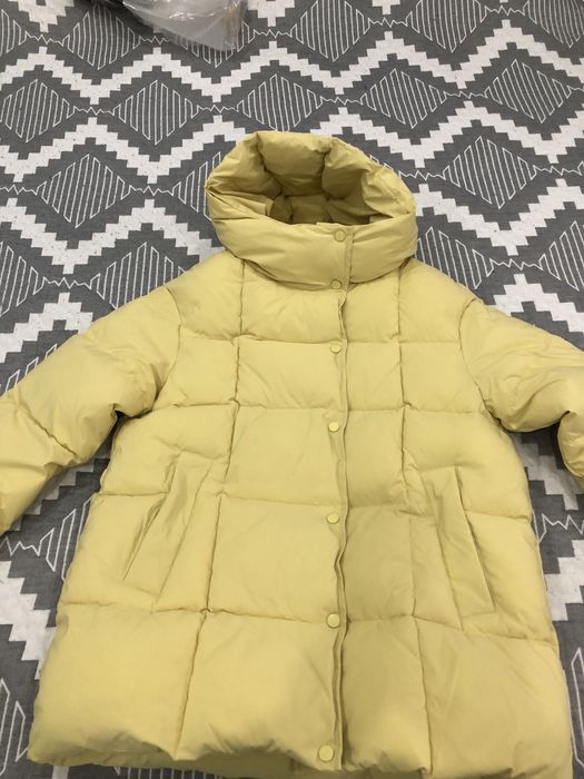 Куртка пуховик отличного качества.