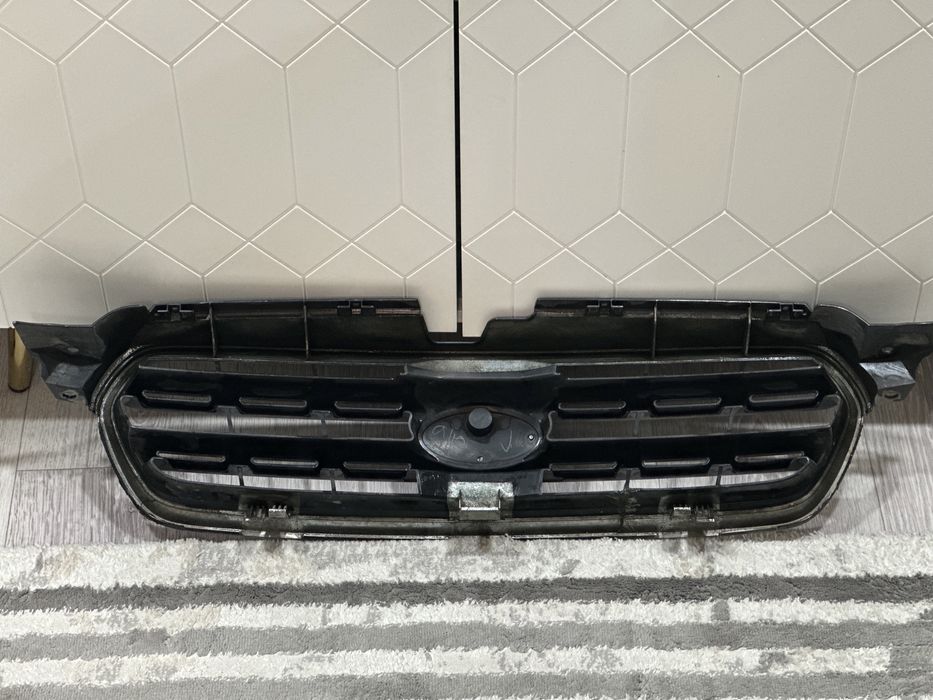 Решетка субару аутбэк 2005