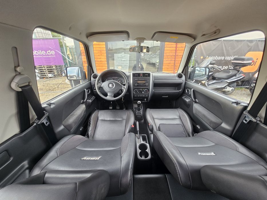 Suzuki jimny Style.3 Benzina 2011.07,Euro5 4x4 cu reductor Aer condiționat, Jante   Posibil rate *
