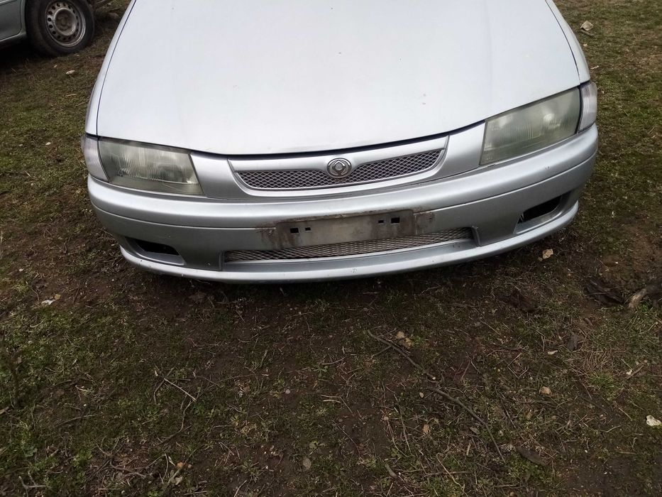 Мазда на части 323