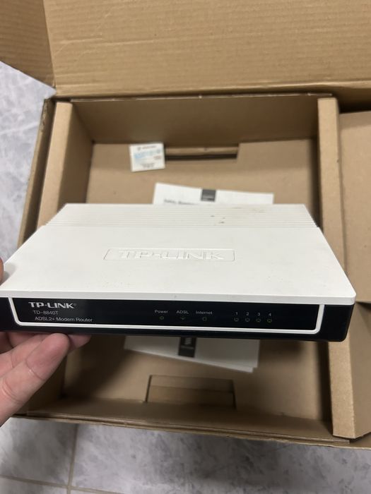 Маршрутизатор со встроенным модемом ADSL2+