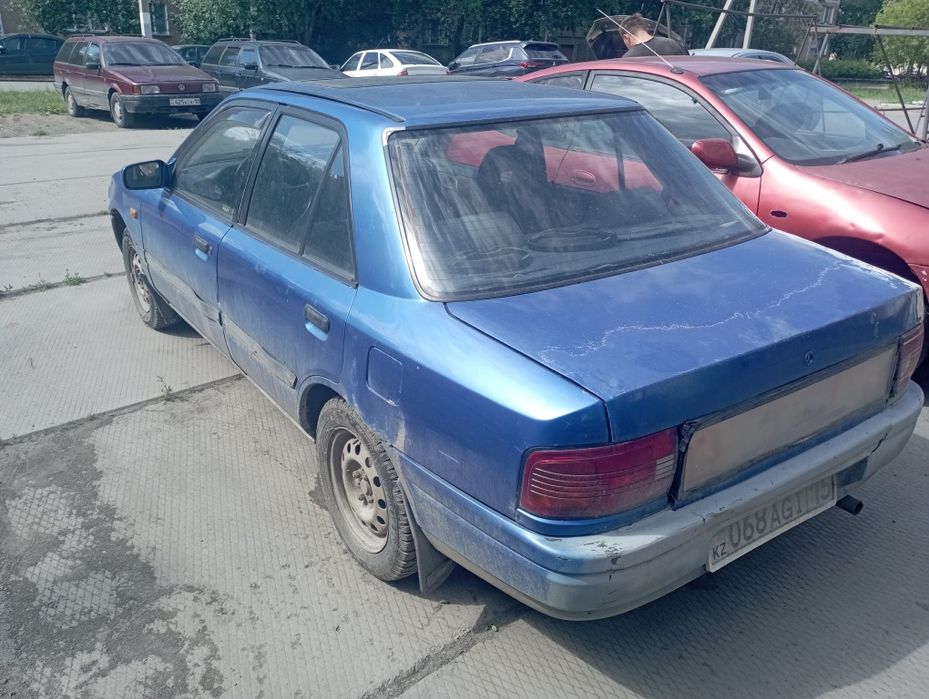 Мазда 230000 тенге