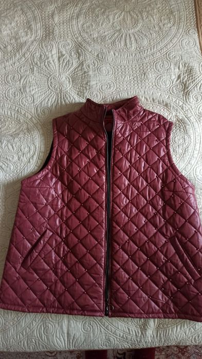 Продам женскую жилетку
