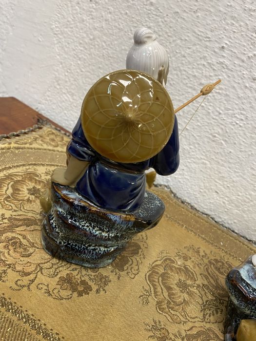 Стари азиятски фигури рибари