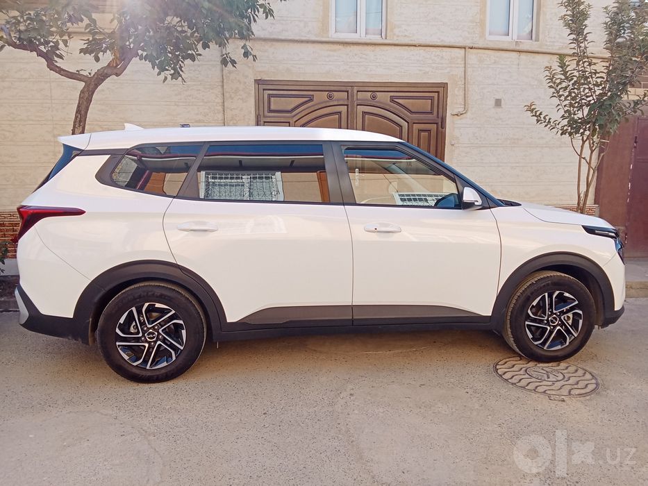 Kia Carens 2- pozitsiya