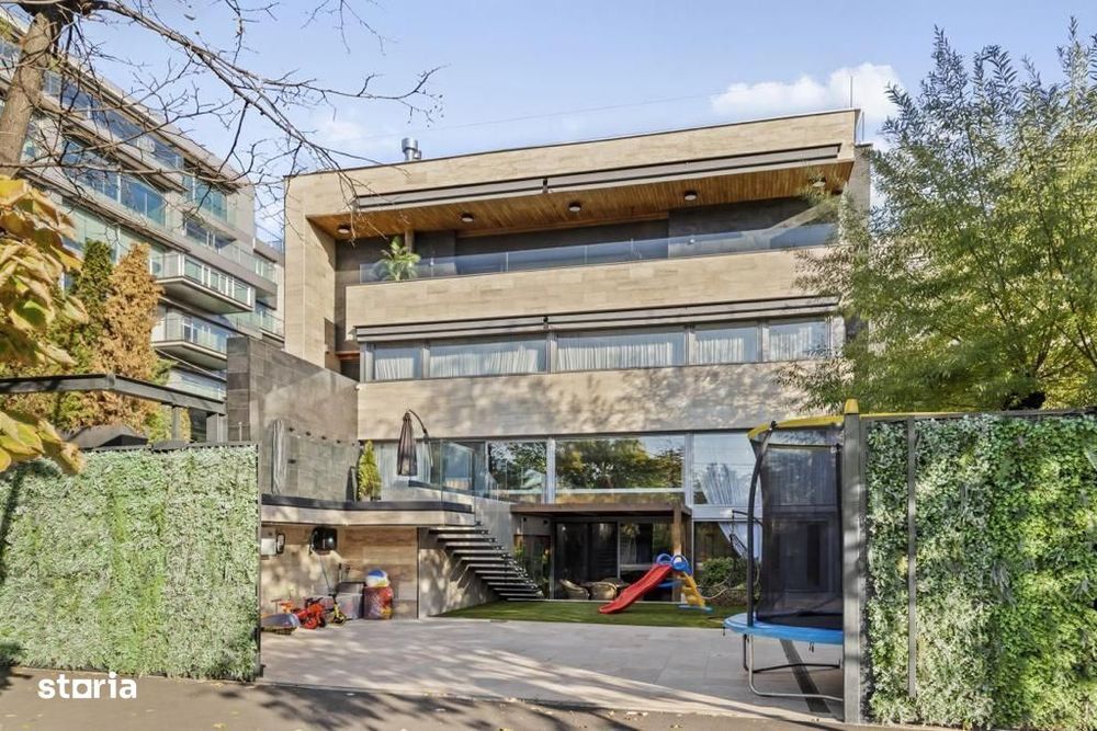 Vilă de autor pe malul Lacului Floreasca: Design iconic și piscină