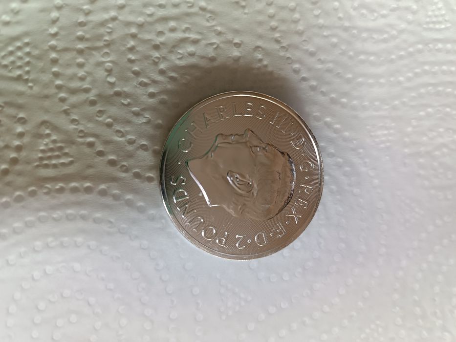 Монета серебряная