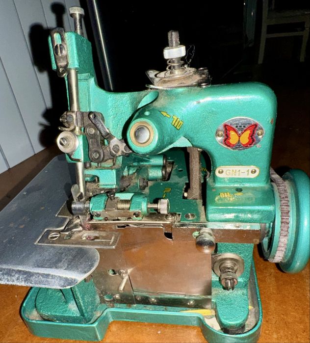 Оверлок швейная машина