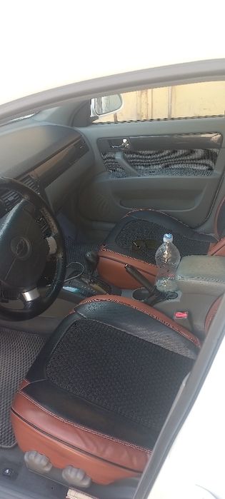 ласетти 2013 оптра автомат