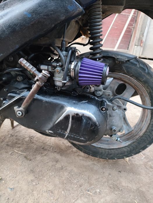 Хонда дио аф 34 .