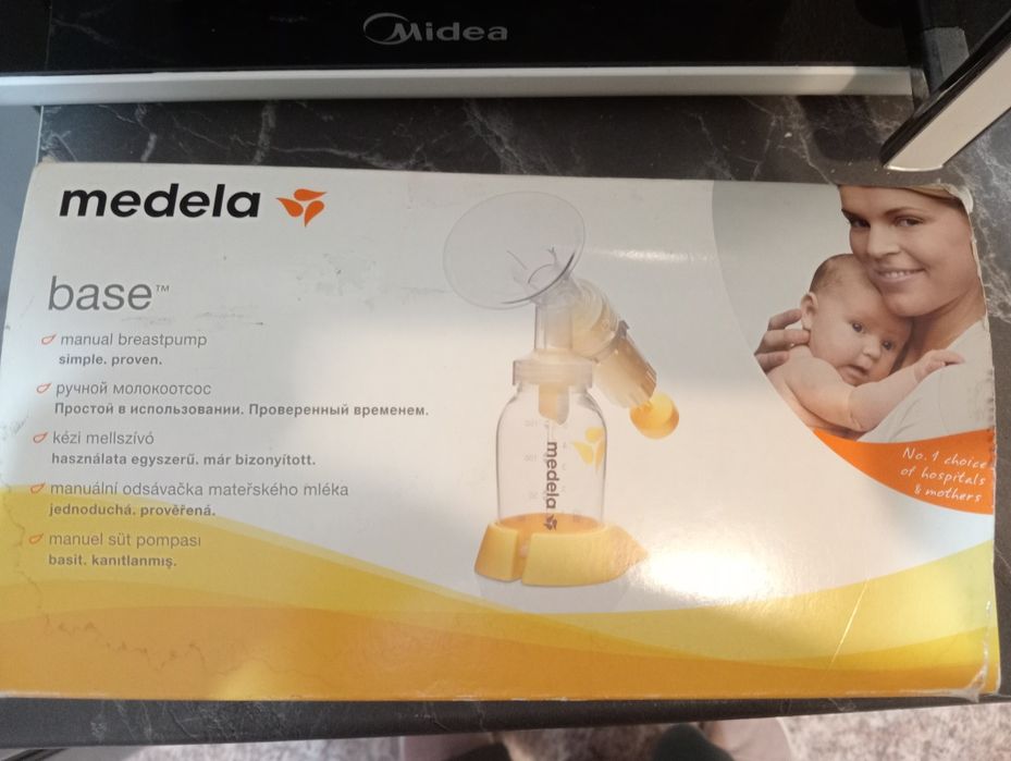 Medela: Молокоотсос ручной BASE