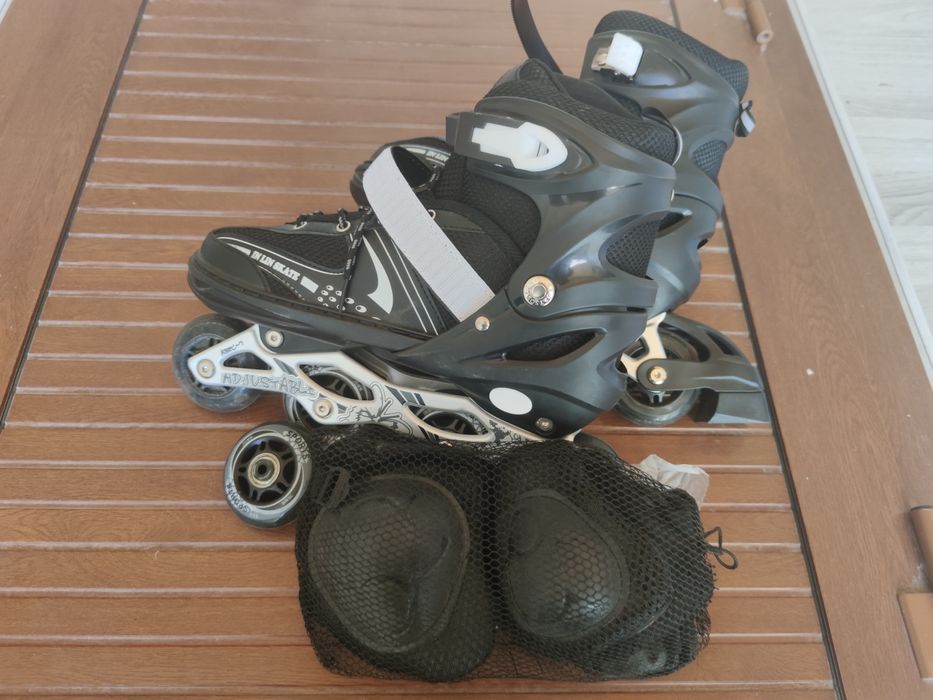 Роликовые коньки