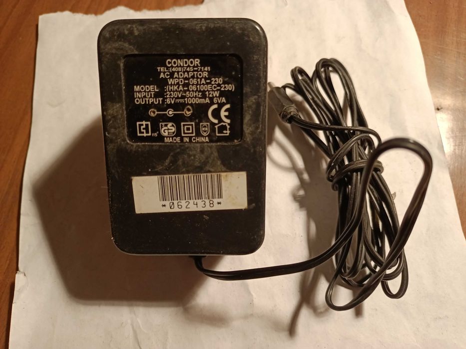 Продам адаптер питания  6V--1000mA.