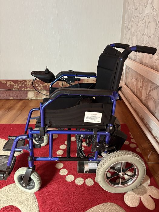 Электрическая инвалидная коляска