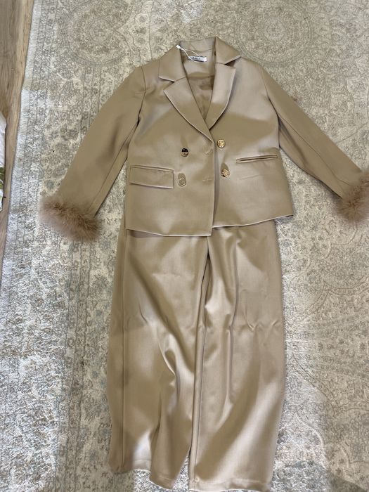 Костюм сатылады