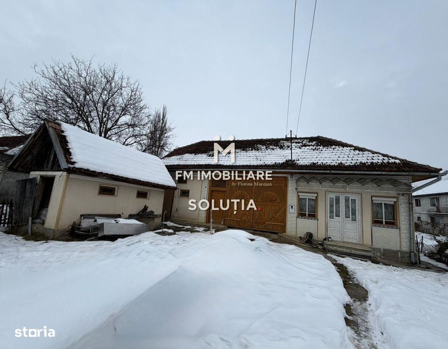 Casă cu teren generos în Buciumi