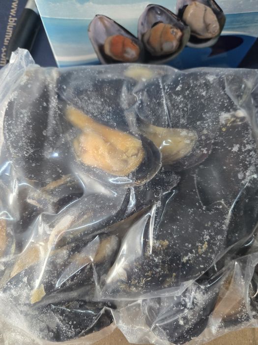 Мидии в половине раковины