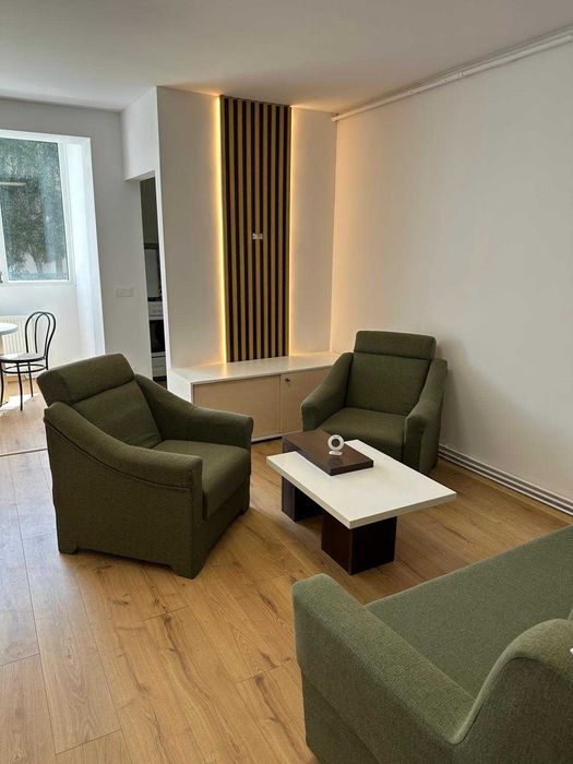 Locuiești sau câștigi? Apartament central, parter, ideal locuință sau business – complet utilat