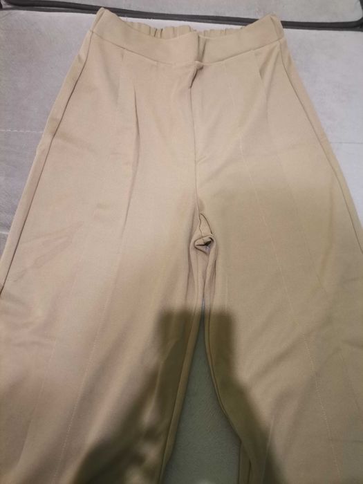 Панталон с висока талия и широк крачол Mango