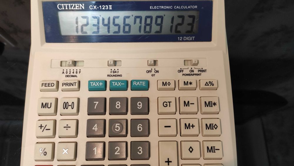 Citizen CX-123 II  печатающий калькулятор.