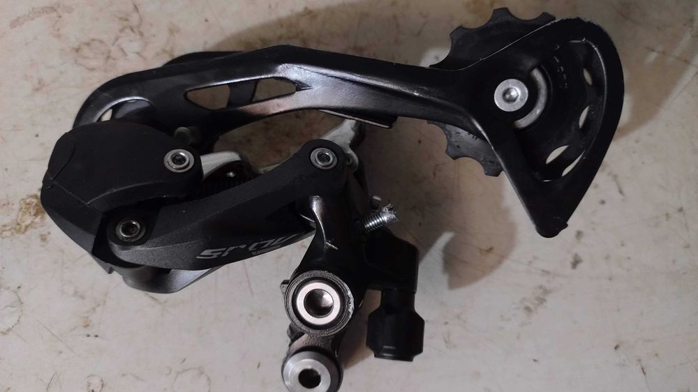 Vând pinioane, lant, schimbator, manetă schimbator 2x9 Shimano