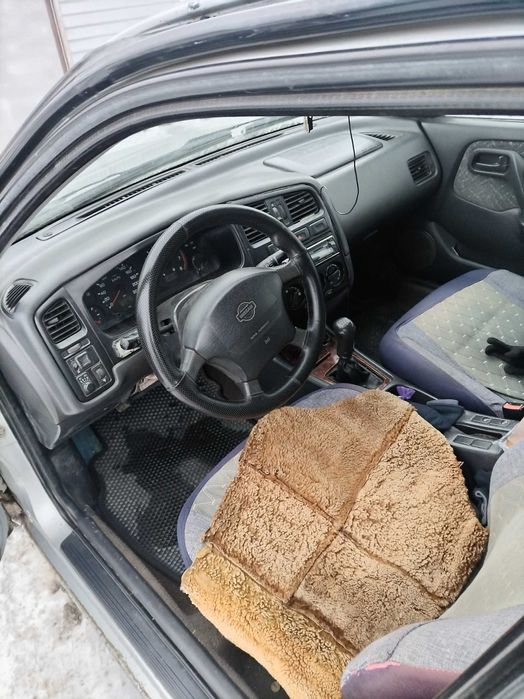 Ниссан примера р11 1999 год